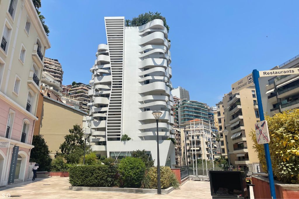 La Stella building in Monaco, a bold and modern architectural landmark with sleek lines.