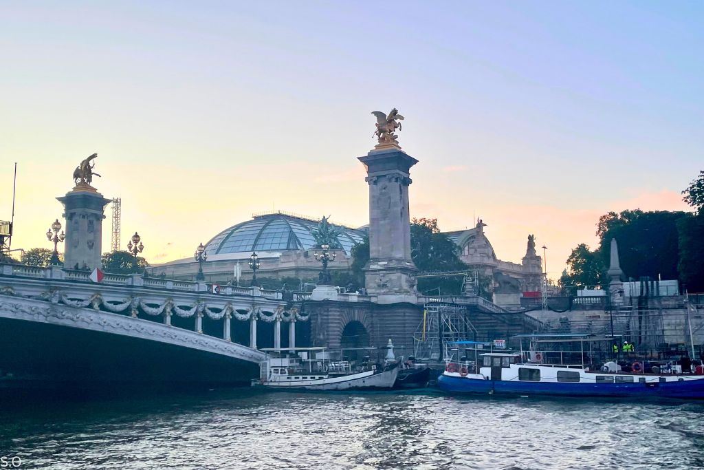 The stunning glass-domed roof of the Grand Palais, a historic exhibition hall and museum in Paris