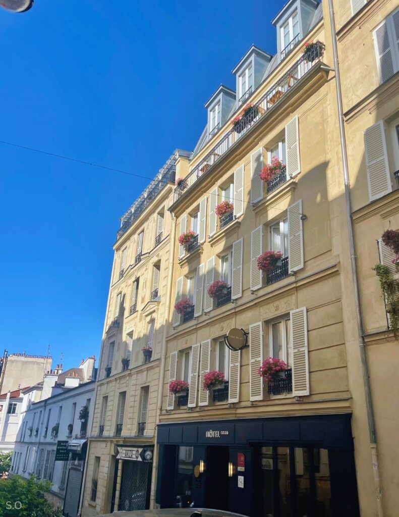 Hotel Des Arts Paris Montmartre exterior on a charming Montmartre street