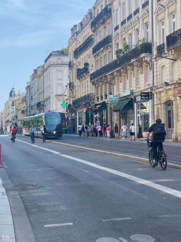 Bordeaux street view with a pharmacy sign